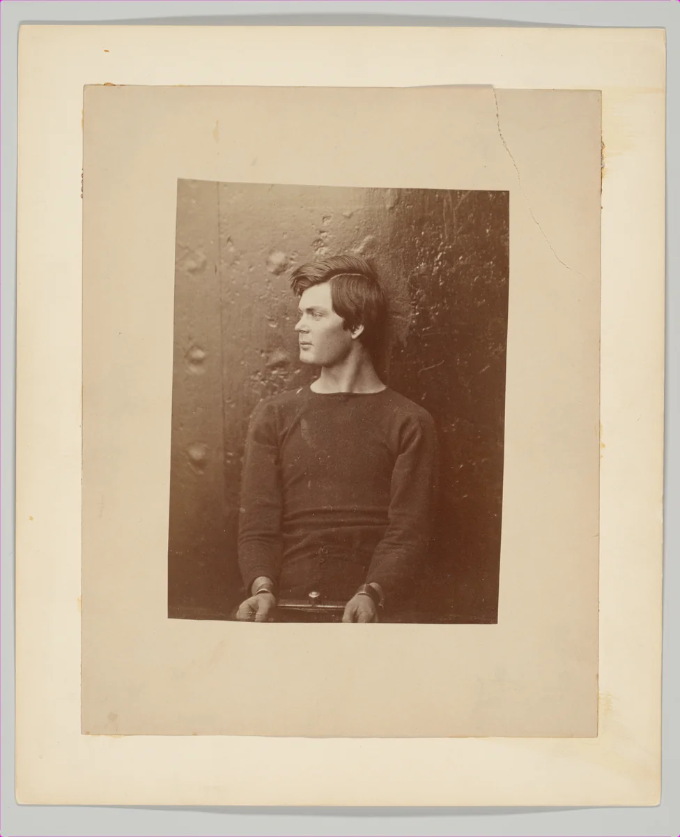 [Lewis Payne (Lewis Powell), Lincoln Assassination Conspirator, in Sweater, Seated and Manacled on the USS Saugus, Washington Navy Yard] by Alexander Gardner, photograph, 1865