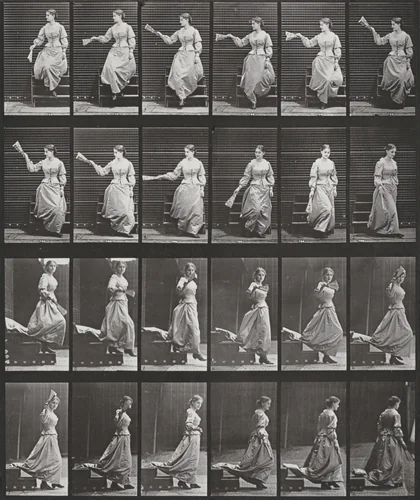 Plate Number 140. Descending stairs, looking around and waving a fan by Eadweard Muybridge, photograph, 1887