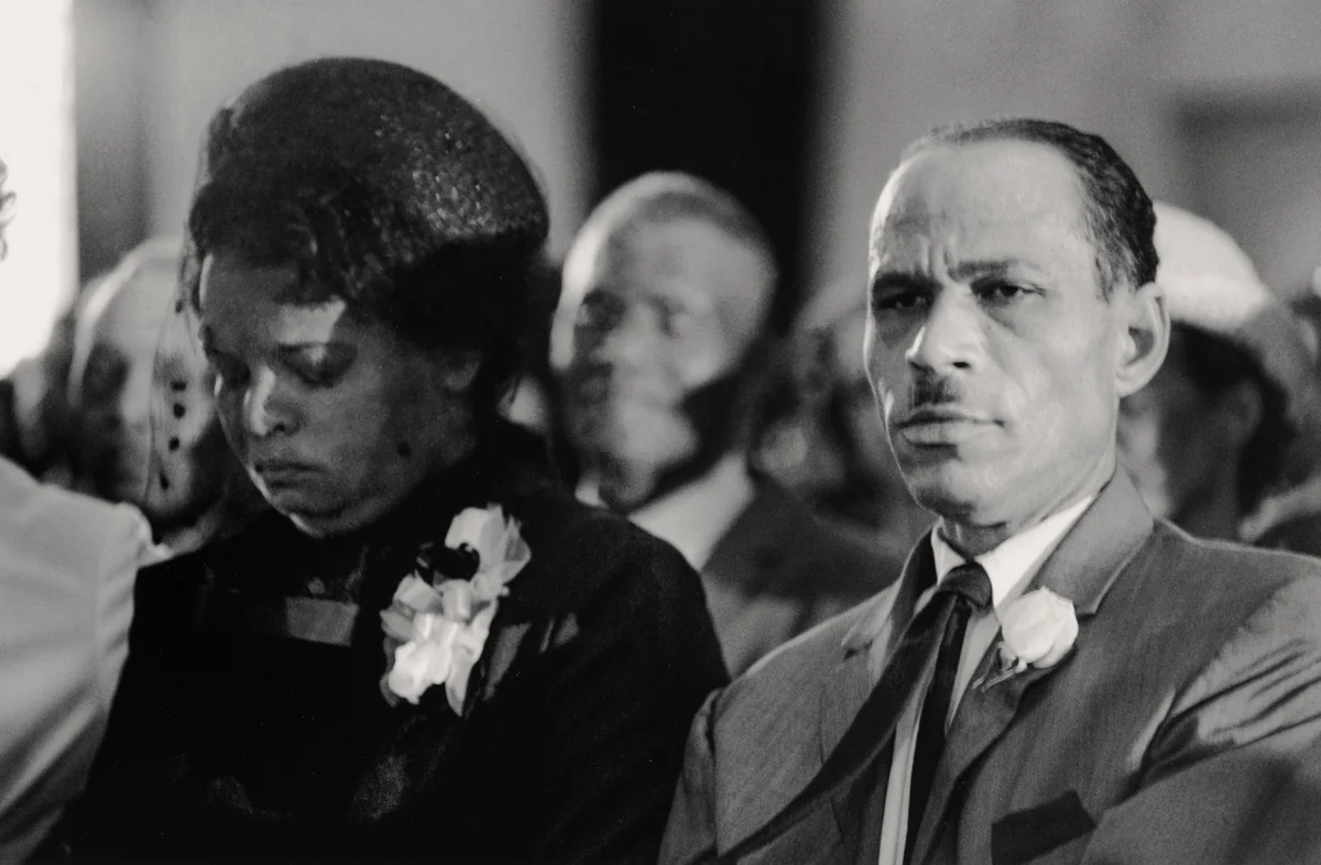 Mother, Myrtle Greene Burton, and Stepfather, Matt Burton, During the Funeral of Their Son James Earl Green, Jackson, Mississippi by Doris A. Derby, photograph, 1970