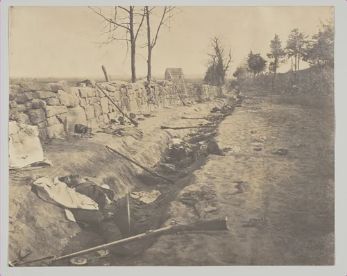 Rebel Dead Behind Stone Wall, Fredericksburgh by Andrew Joseph Russell, photograph, 1863