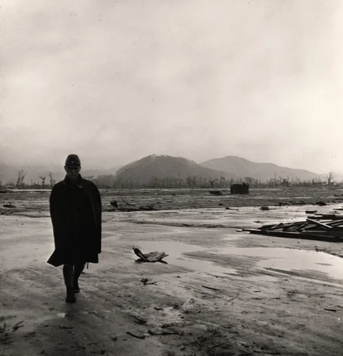 Site of the Epicenter of the Bomb Blast near the Heart of the City. A Japanese Soldier Walks Where an Army Barracks Once Stood, Hiroshima, Japan by Wayne Miller, photograph, 1945
