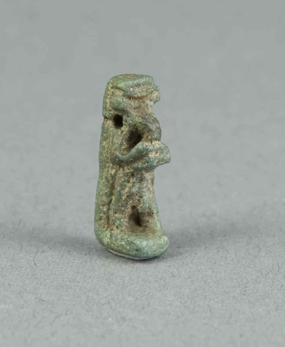 Amulet of the God Thoth Holding an Offering Table (?) by Egyptian, metalwork, -664--332