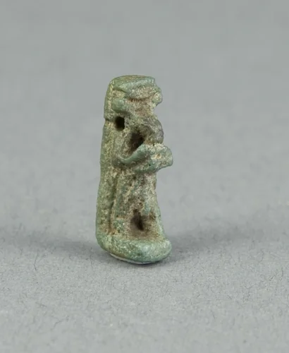 Amulet of the God Thoth Holding an Offering Table (?) by Egyptian, metalwork, -664--332