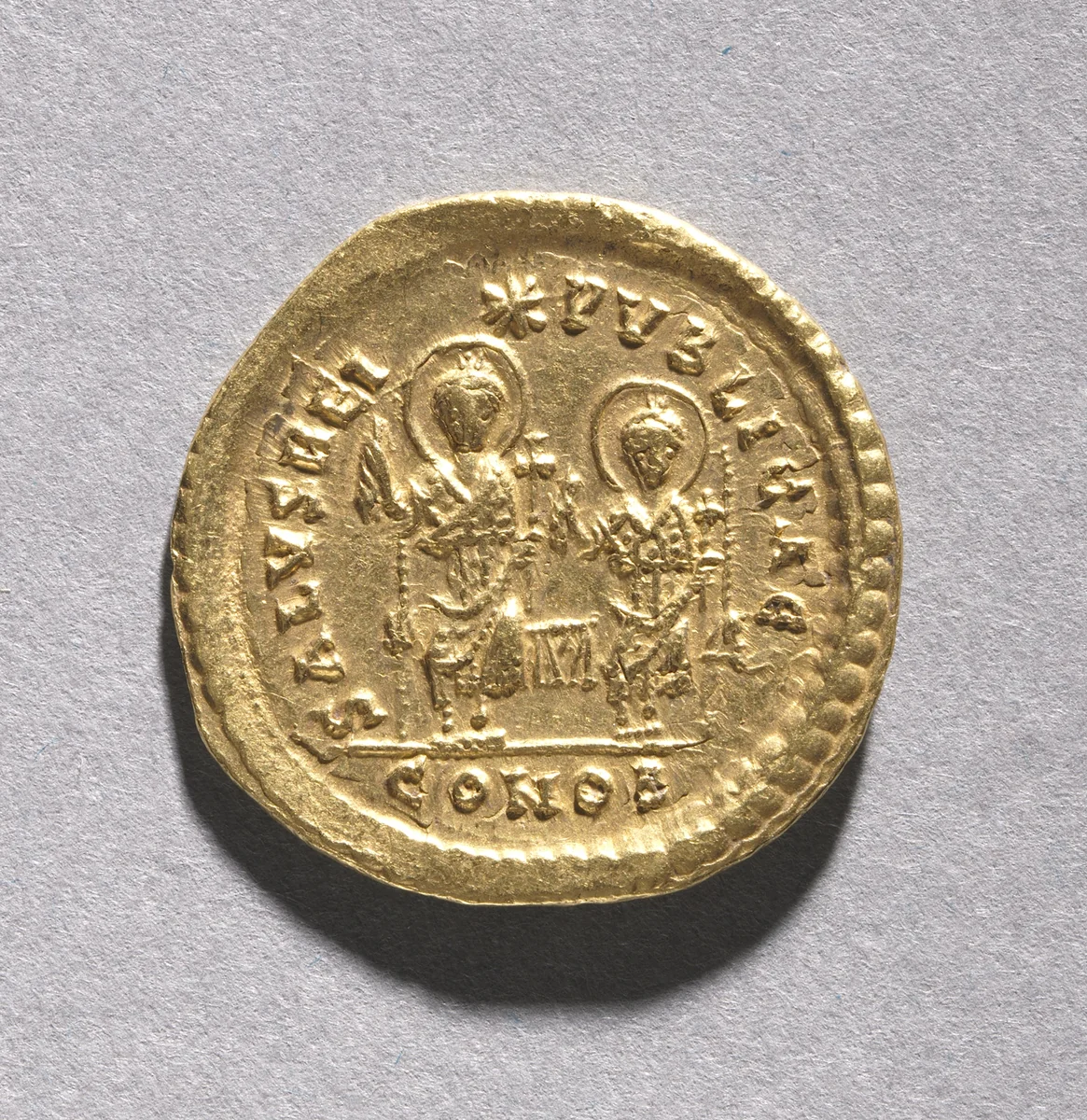 Solidus of Theodosius II and Valentinian III (reverse) by Unknown, metalwork, 408-425