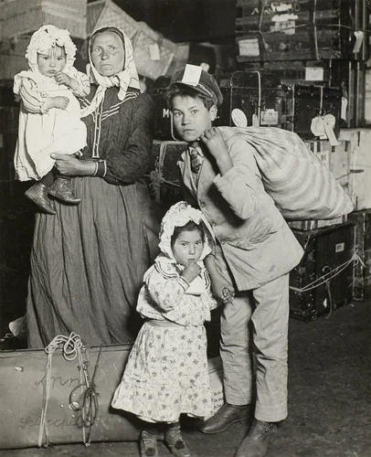 Italian Family Seeking Lost Baggage, Ellis Island by Lewis Wickes Hine, photograph, 1905