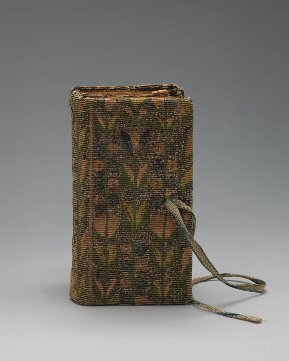 Bookbinding of repeat foliate pattern by William Sheldon, textile, 1556-1618