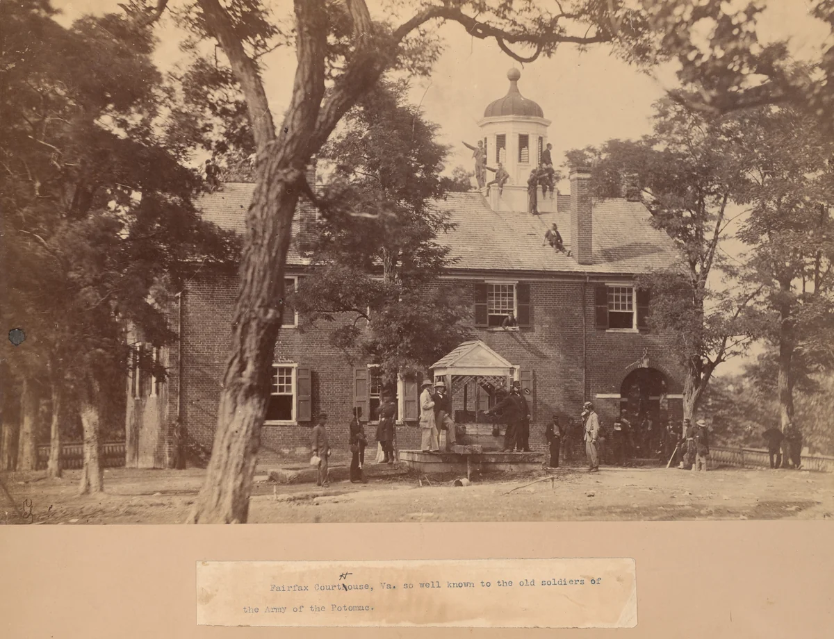Fairfax Court House, Virginia, with Union Soldiers in Front and on the Roof by Mathew B. Brady or Timothy O'Sullivan, photograph, 1863