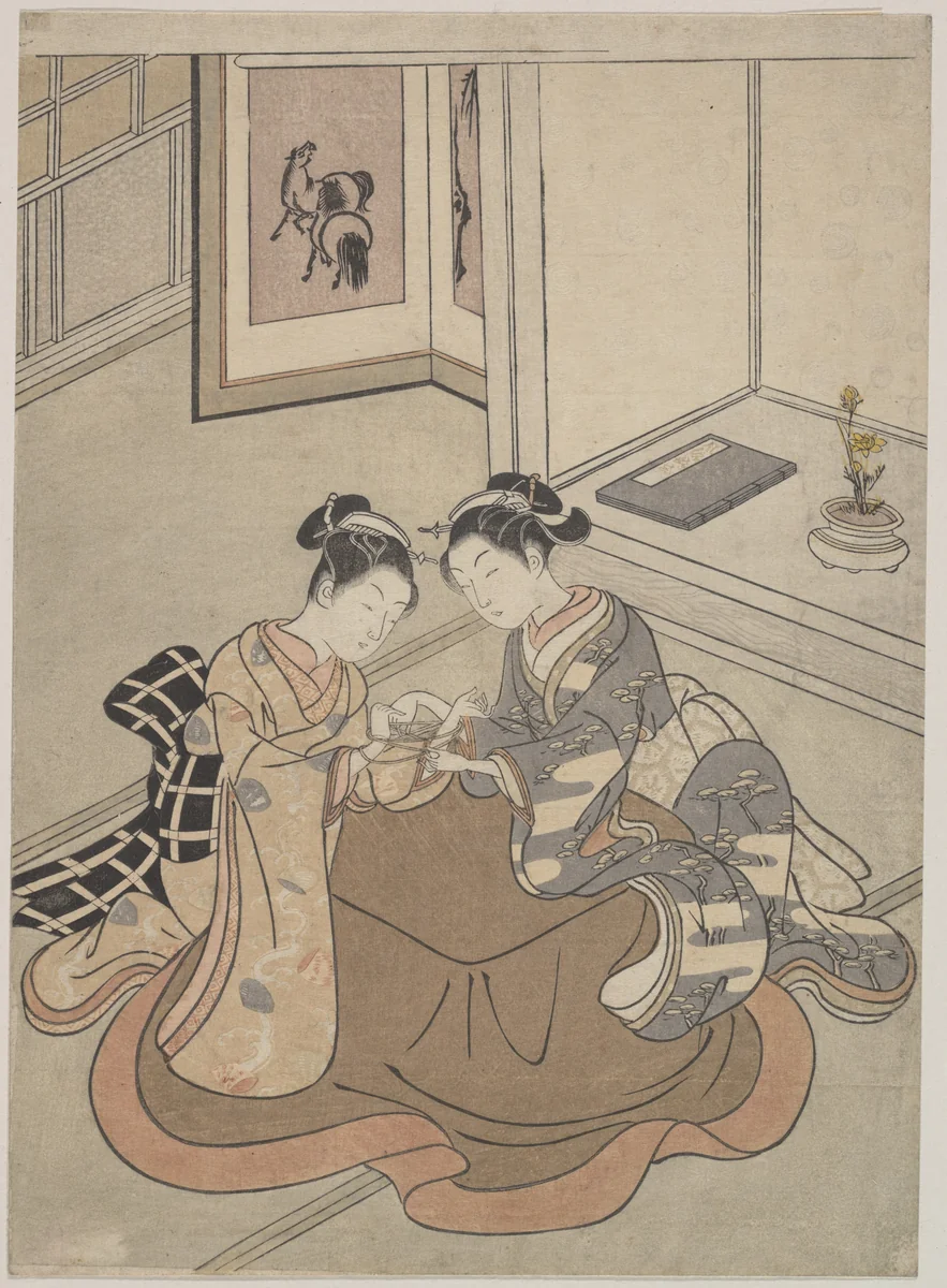 Two Young Women Seated by a Kotatsu Playing Cat's Cradle by Suzuki Harunobu (鈴木春信), print, 1755-1775