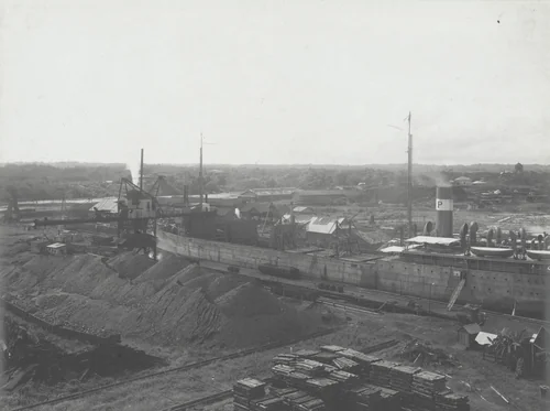 Atlantic Terminals. U.S. Collier unloading at Pier #14 by Unidentified Photographer, photograph, 1915