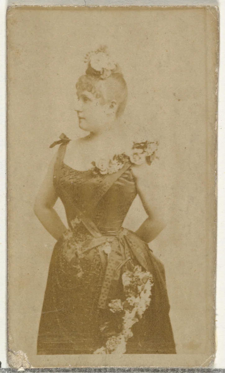 [Actress wearing gown decorated with flowers], from the Actors and Actresses series (N145-8) issued by Duke Sons & Co. to promote Duke Cigarettes by W. Duke, Sons & Co., photograph, 1890-1895
