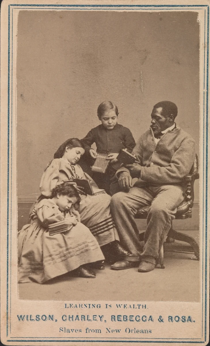 Learning is Wealth—Wilson, Charley, Rebecca, and Rosa, Slaves from New Orleans by Charles Paxson, photograph, 1863-1864