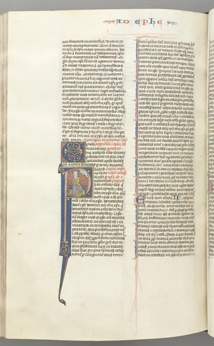 Fol. 450v, Ephesians, historiated initial P, Paul seated with a sword, the bust of God above by Unknown, book, 1270-1305