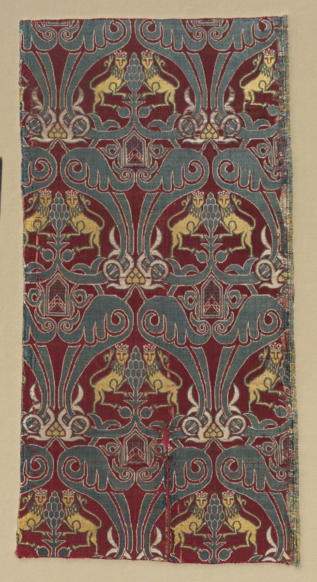 Fragment with crowned lions, palmettes, and escutcheons by Unknown, textile, 1400-1599