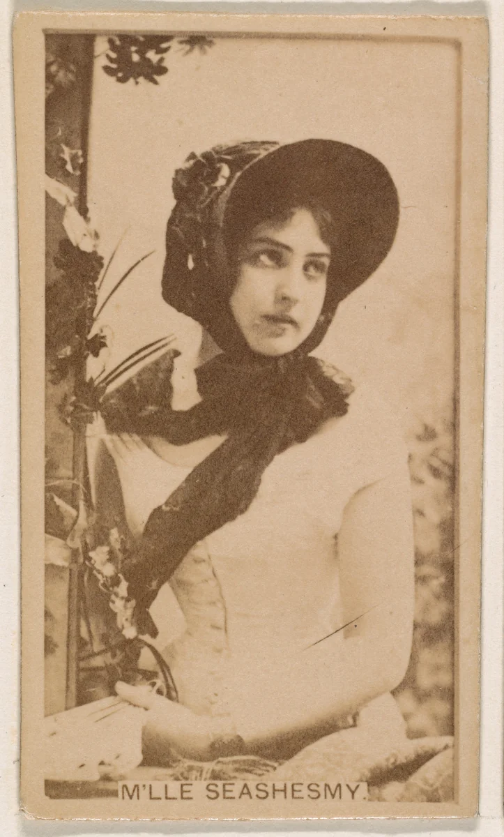 M'lle Seashesmy, from the Actresses series (N245) issued by Kinney Brothers to promote Sweet Caporal Cigarettes by Kinney Brothers Tobacco Company, photograph, 1890