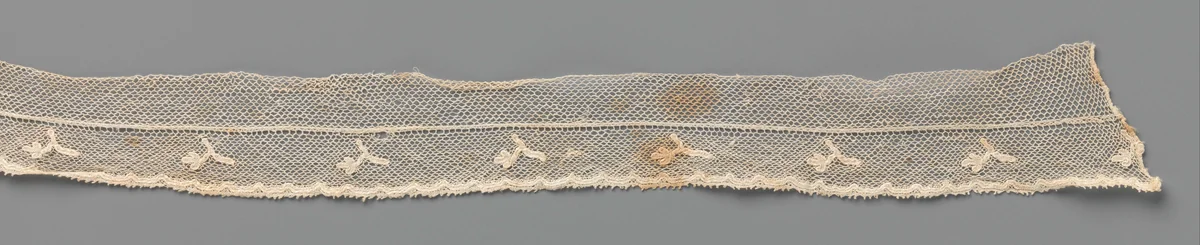 Strook kloskant met hangend takje met drielobbig bloempje by anonymous, other, 1850-1870