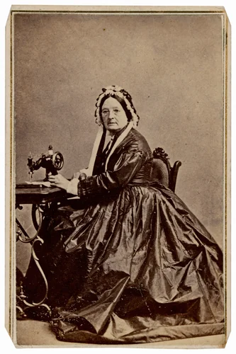 Portrait of a Seamstress with Sewing Machine by Russell Miller, photograph, 1861-1869