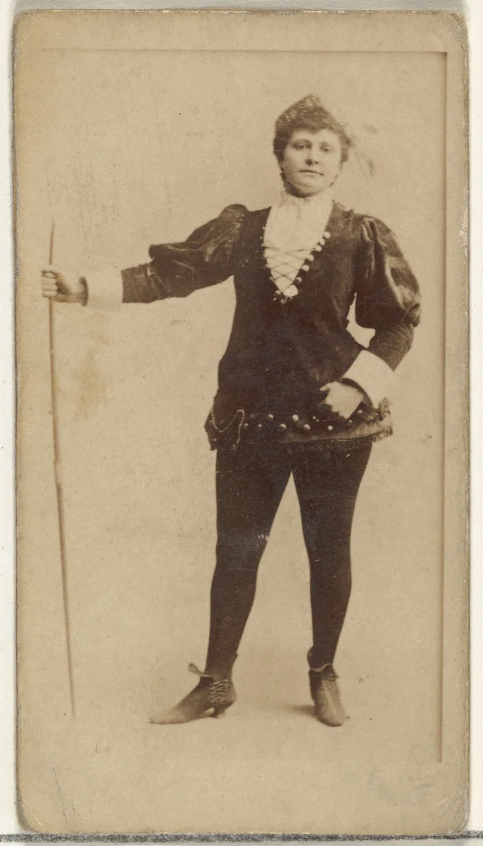 [Actress standing with long staff], from the Actors and Actresses series (N145-8) issued by Duke Sons & Co. to promote Duke Cigarettes by W. Duke, Sons & Co., photograph, 1890-1895