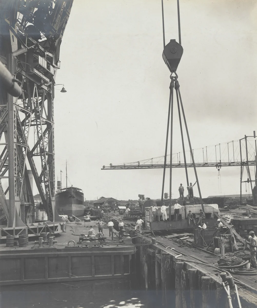 Floating crane "Ajax" showing method of attaching test load to the individual hooks by Unidentified Photographer, photograph, 1915