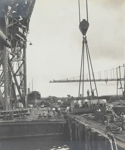 Floating crane "Ajax" showing method of attaching test load to the individual hooks by Unidentified Photographer, photograph, 1915