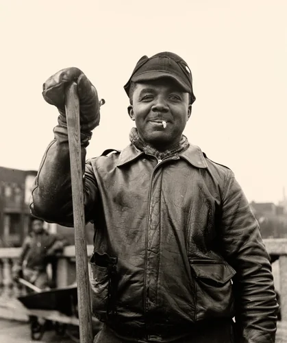 Street Sweeper in World War II Army Surplus Leather Jacket, Chicago, Illinois by Wayne Miller, photograph, 1946