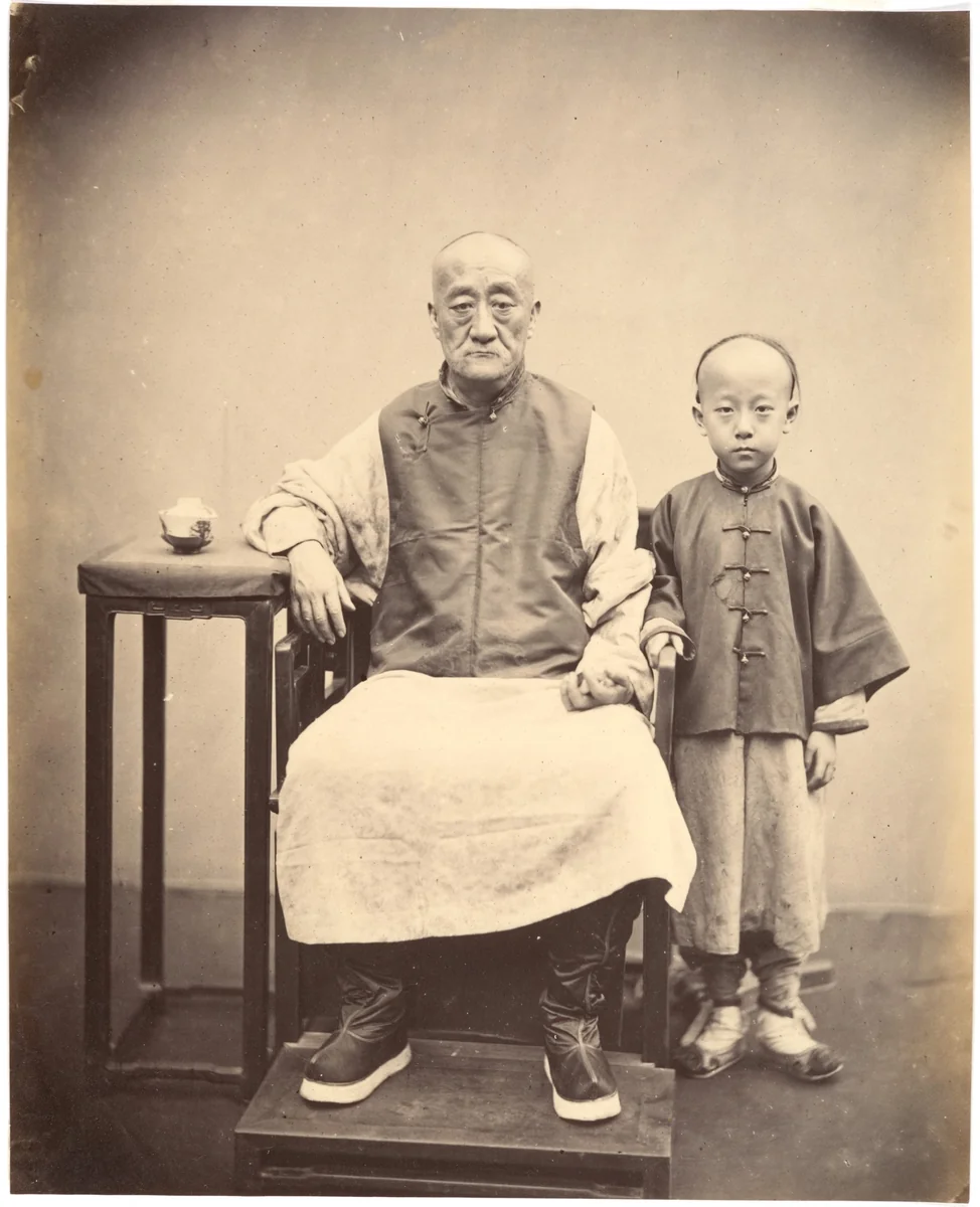Teh Hop-Ho (Canton) and his Son by John Thomson, photograph, 1869