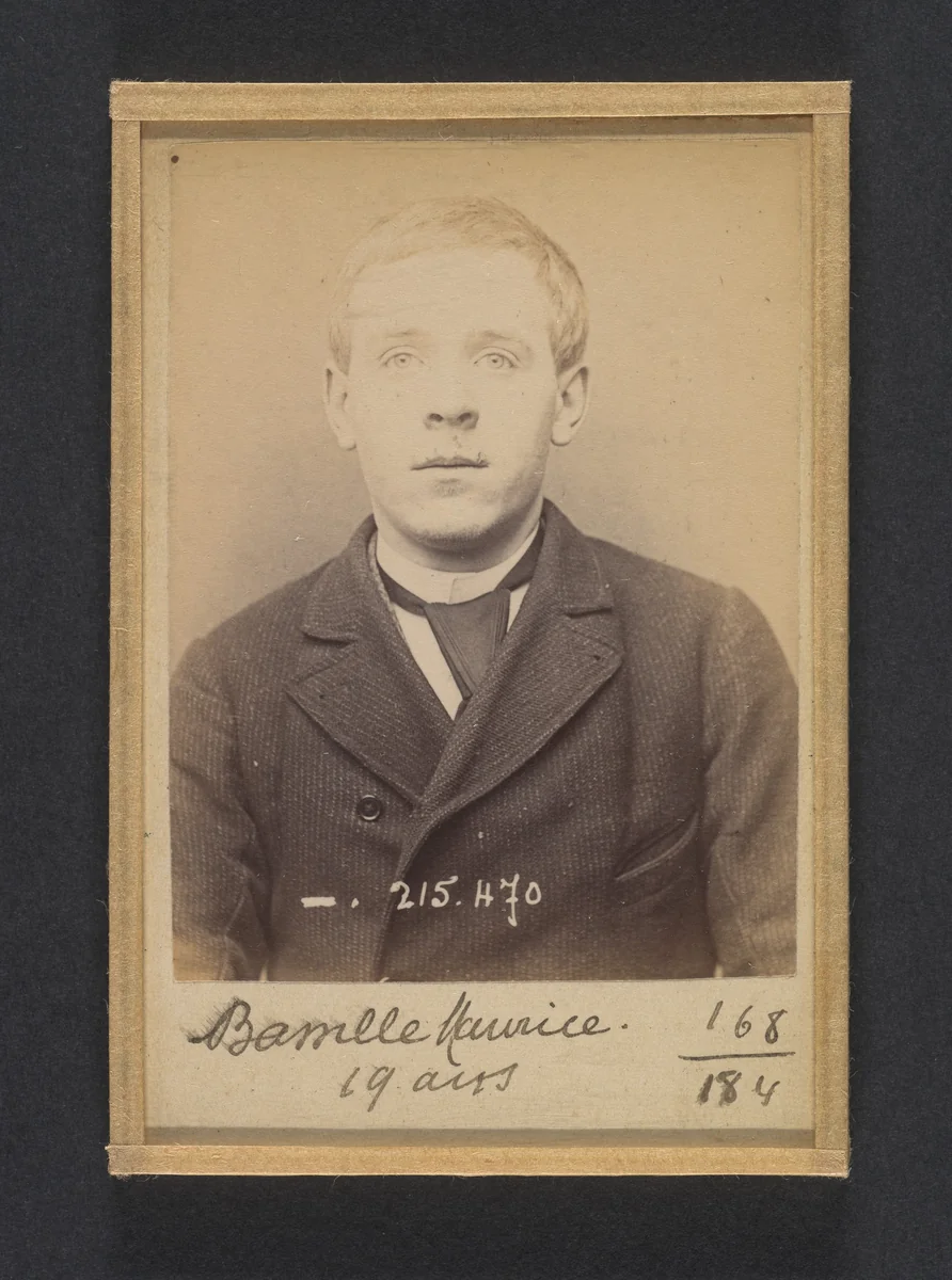 Bassille. Maurice, Eugène. 19 ans, né à Paris Ille. Portefeuilliste. Anarchiste. 9/3/94. by Alphonse Bertillon, photograph, 1894