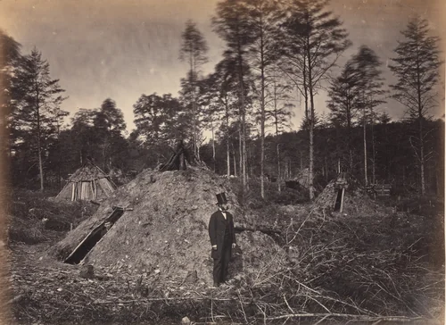 Woodchoppers' Huts in a Virginia Forest. On the Orange & Alexandria Railroad. Wood Supplied U.S.M.R. Railroads under Supervision of Major Brayton by Andrew Joseph Russell, photograph, 1863
