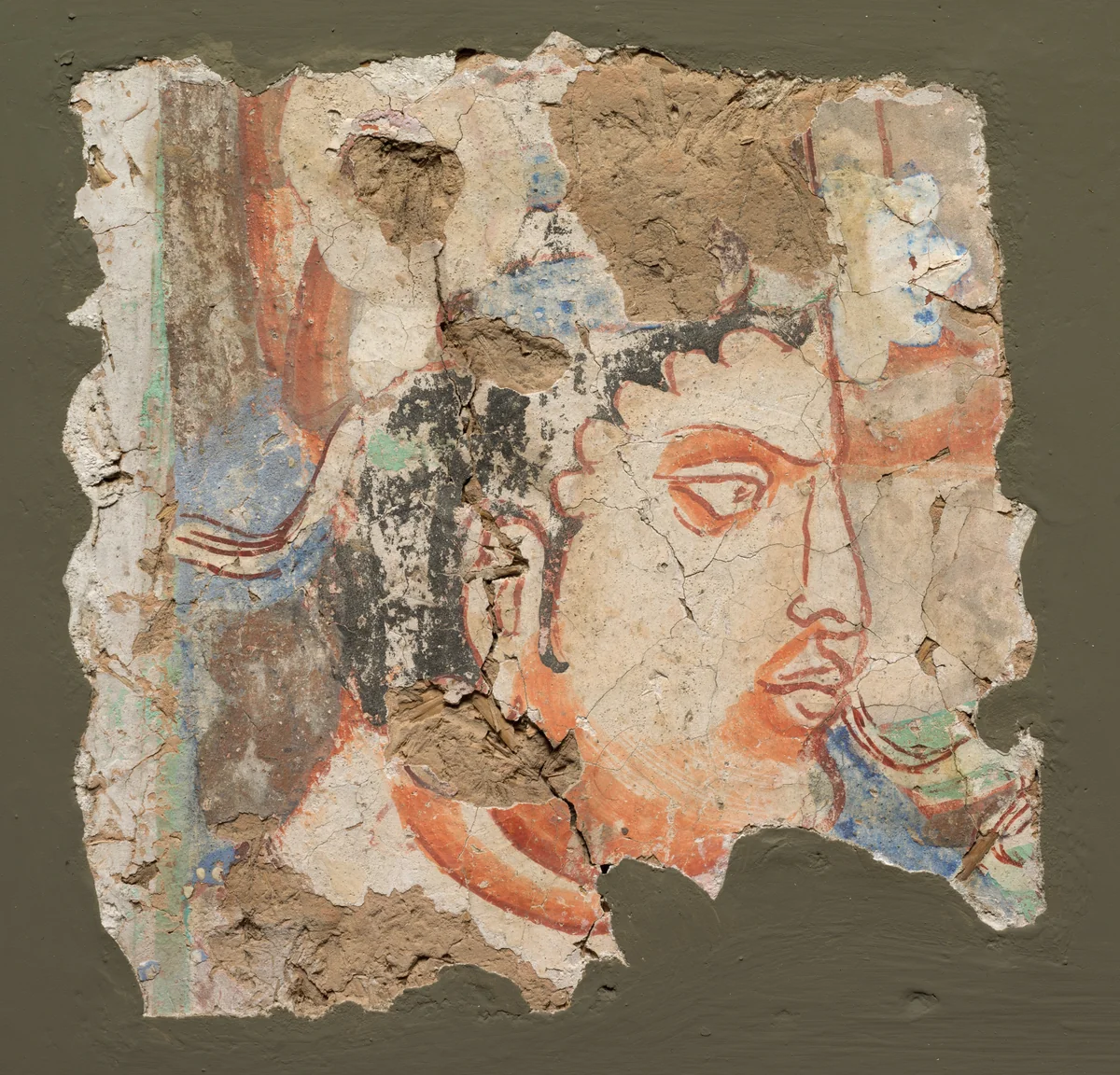 Fragment with a Head of Bodhisattva by Unknown, painting, 600-650