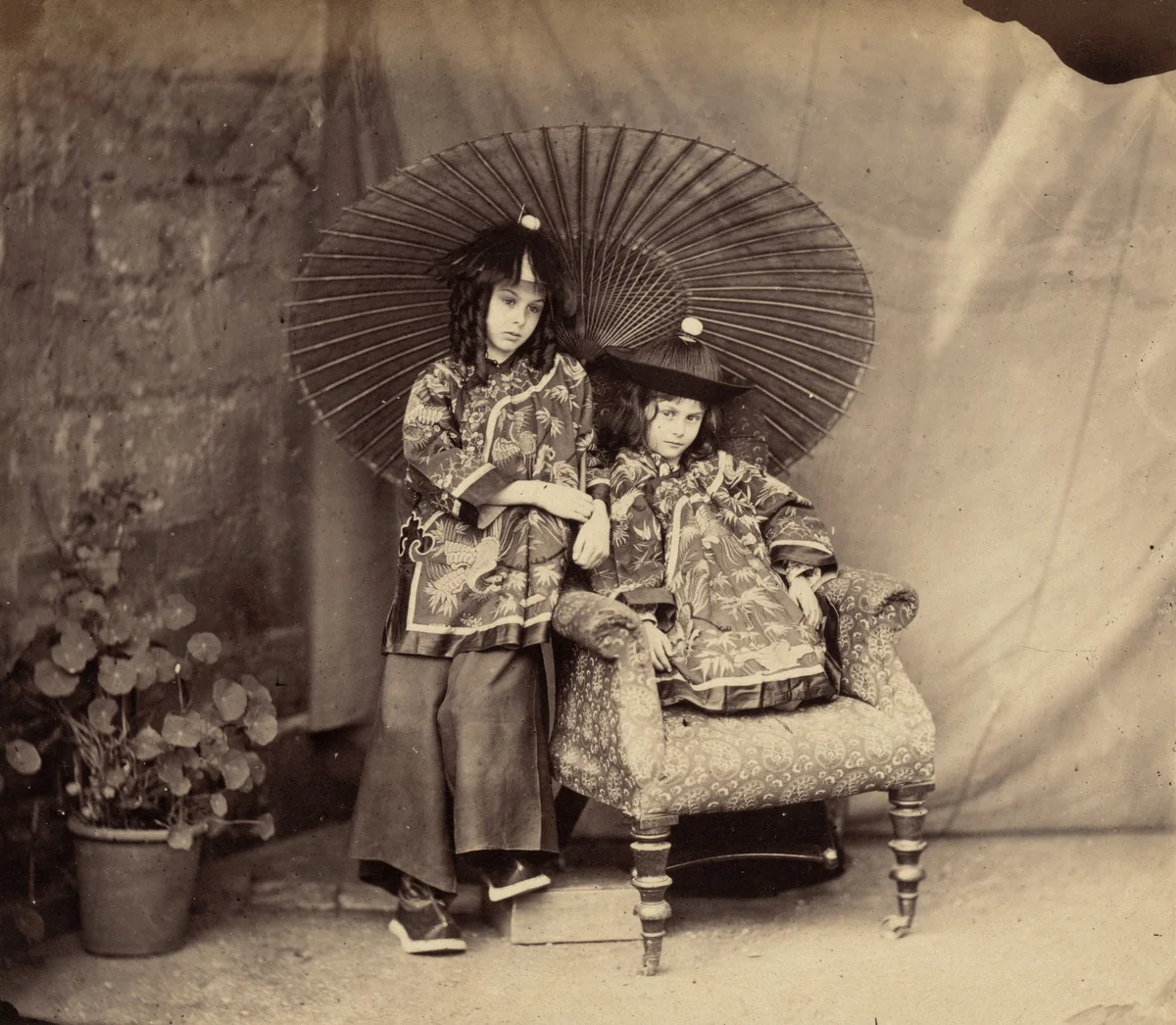 Lorina and Alice Liddell in Chinese Dress by Charles Dodgson, photograph, 1860