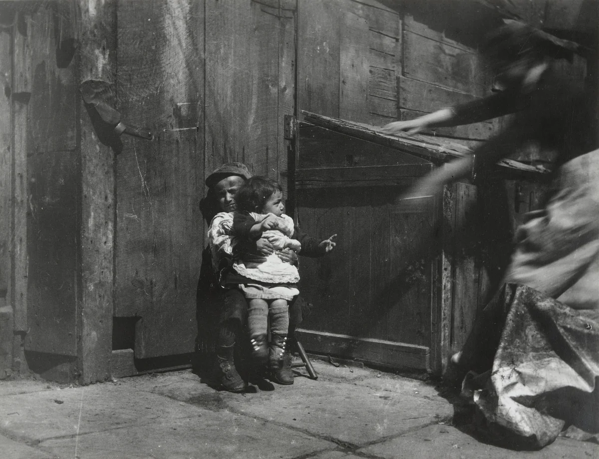 Minding the Baby. Scene in Gotham Court by Jacob August Riis, photograph, 1889