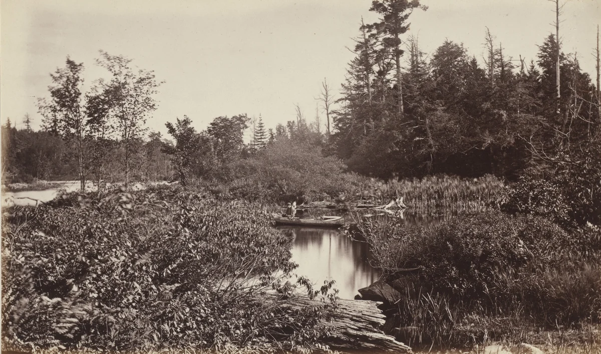 On the 'Outlet' of Brome Lake. 'Dugout; Canoe by Alexander Henderson, photograph, 1865