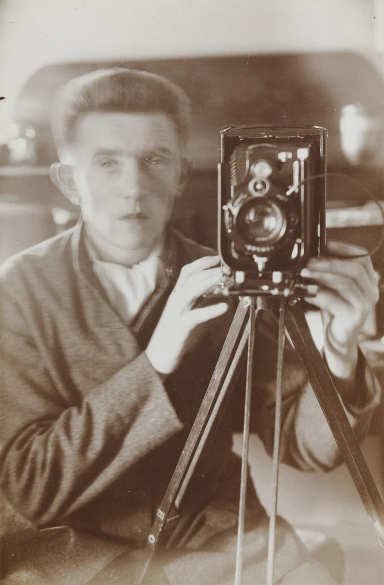 Self-Portrait in Mirror by Otto Lindig, photograph, 1925