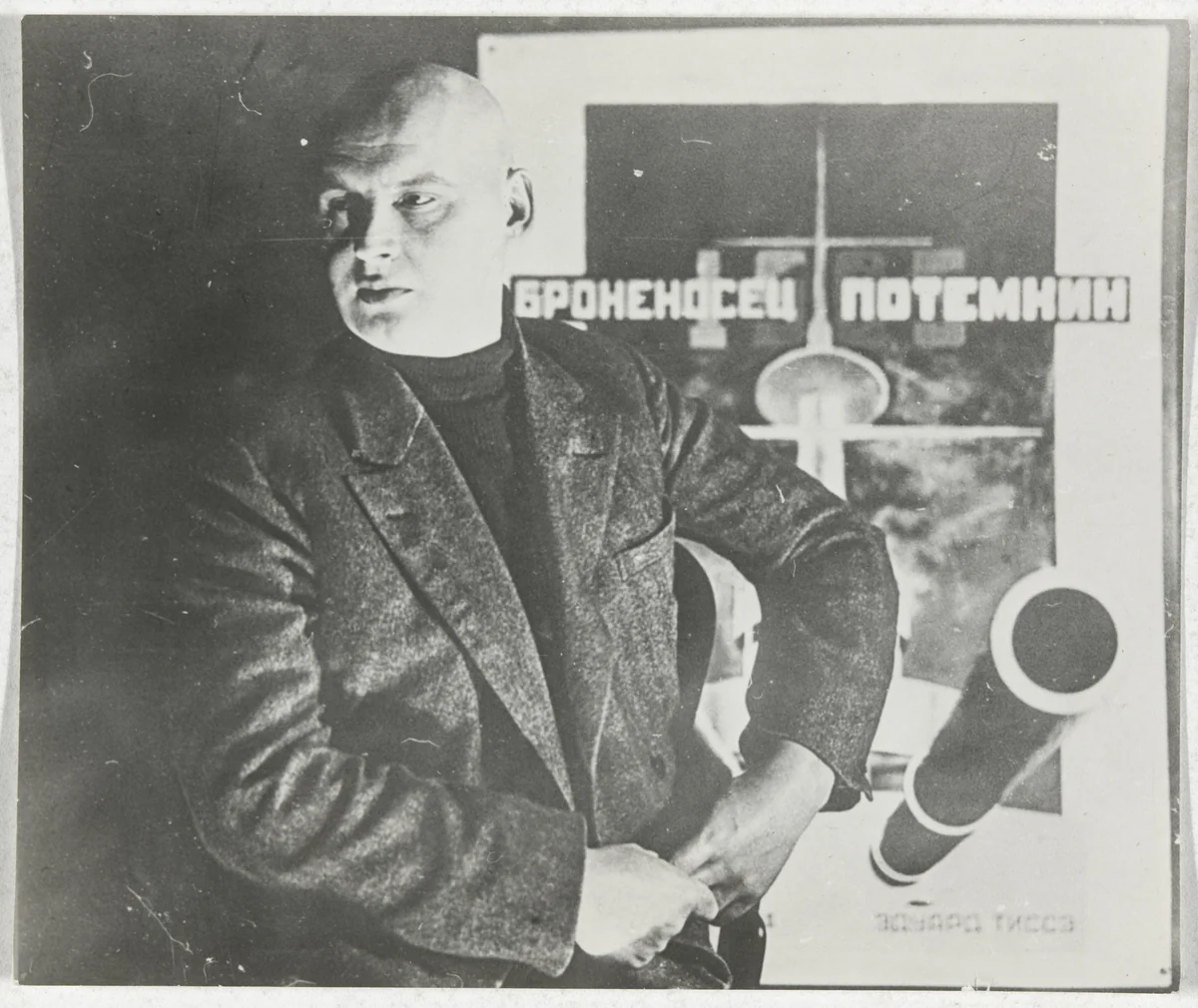 Untitled (Self-portrait with poster for Battleship Potemkin) by Aleksandr Rodchenko, photograph, 1925