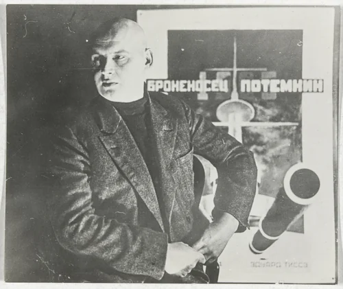 Untitled (Self-portrait with poster for Battleship Potemkin) by Aleksandr Rodchenko, photograph, 1925