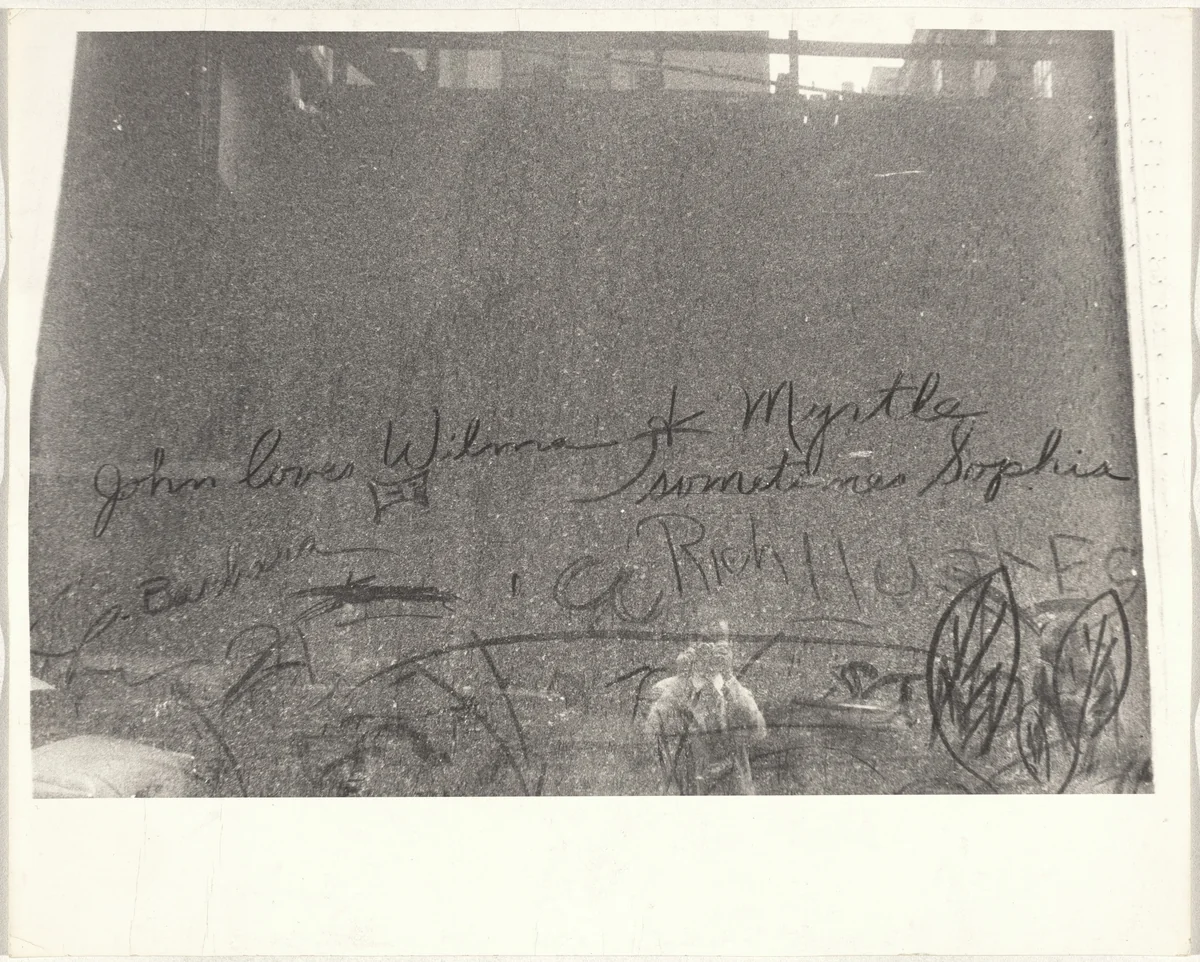 Handwriting on window, convention hall--Chicago by Robert Frank, photograph, 1956