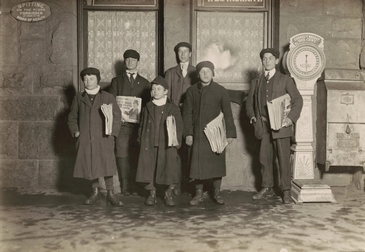 8:30 P.M. Group of newsboys selling at the depot, Hartford, Connecticut. Smallest boy 11 years old. by Lewis Wickes Hine, photograph, 1909