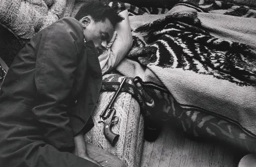 Sleeping Marcos by Jim Goldberg, photograph, 1989