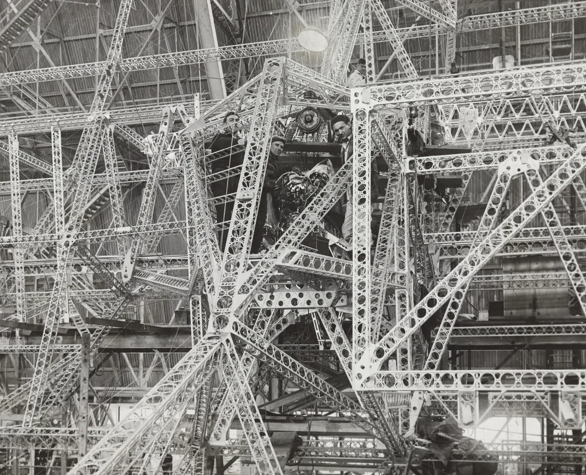 "The Motive Power To Drive a Giant of the Air Through the Clouds" by Times Wide World Photos, photograph, 1931