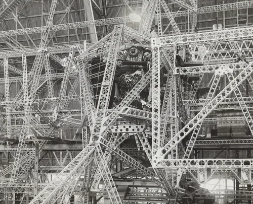 "The Motive Power To Drive a Giant of the Air Through the Clouds" by Times Wide World Photos, photograph, 1931