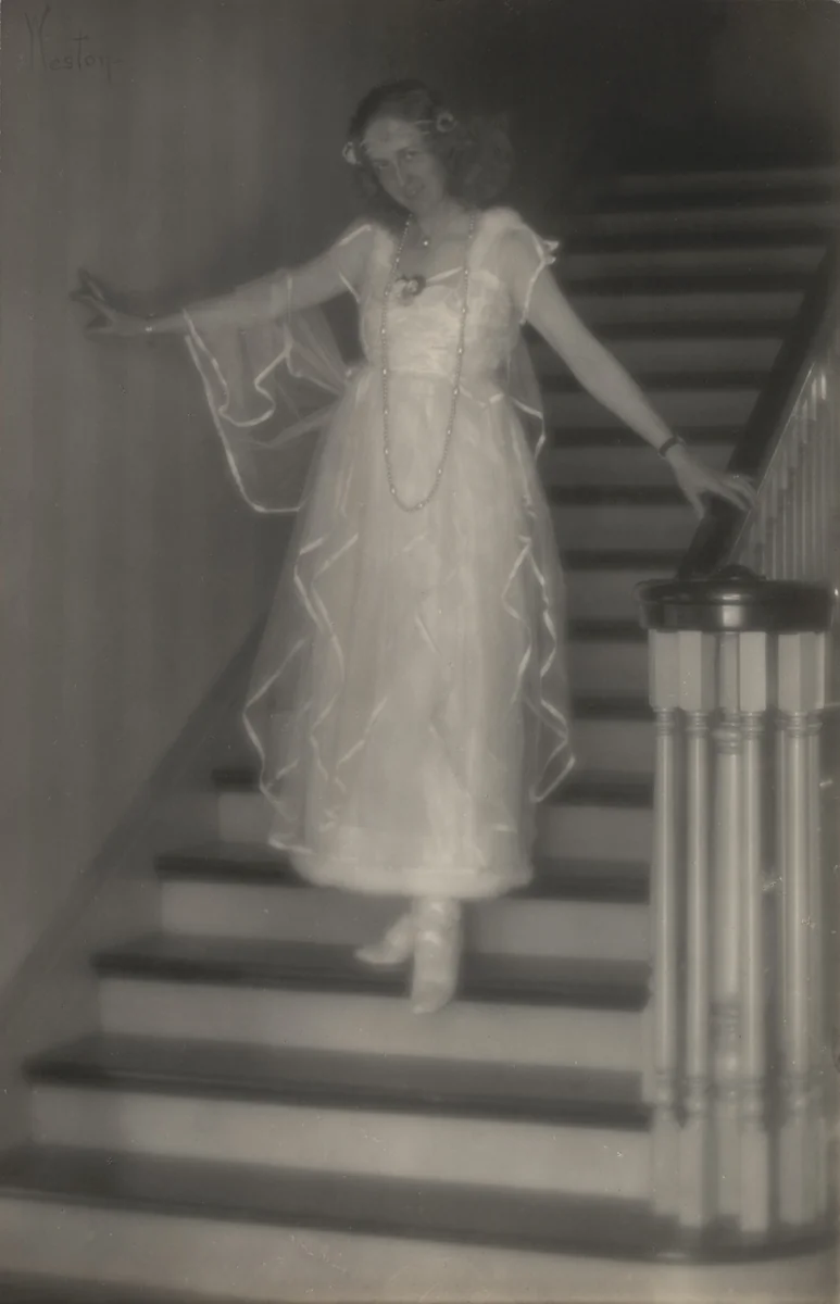 Violet Romer. (on stairs, hand on banister) by Edward Weston, photograph, 1917