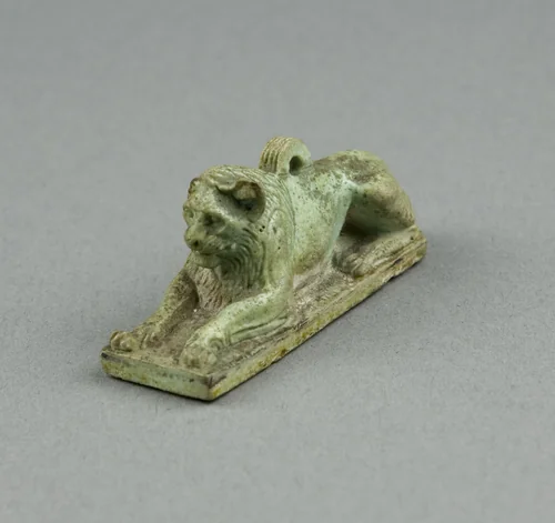 Amulet of a Crouching Lion by Egyptian, metalwork, -664--332