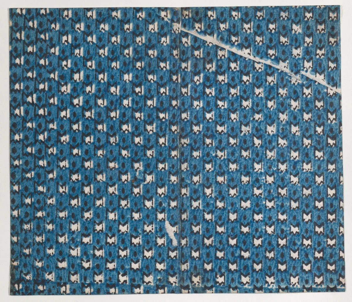 Book cover with overall pattern of stars within ovals by anonymous, print, 1800-1900
