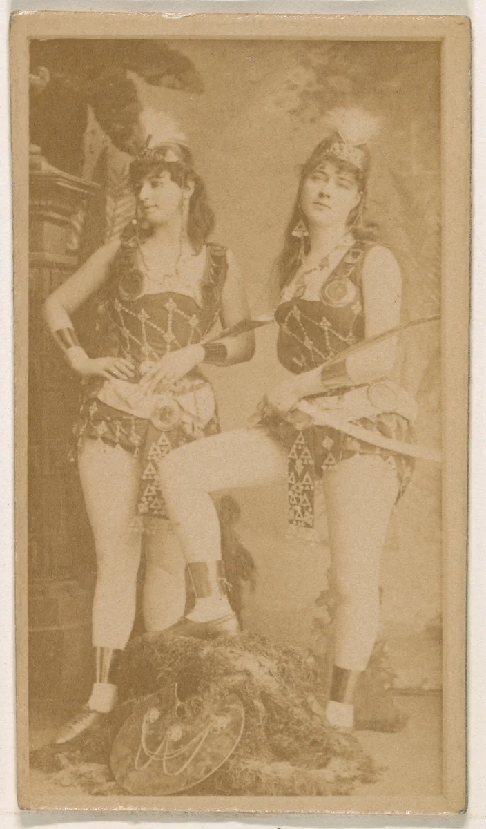 Two actresses, one holding sword, from the Actresses series (N245) issued by Kinney Brothers to promote Sweet Caporal Cigarettes by Kinney Brothers Tobacco Company, photograph, 1890