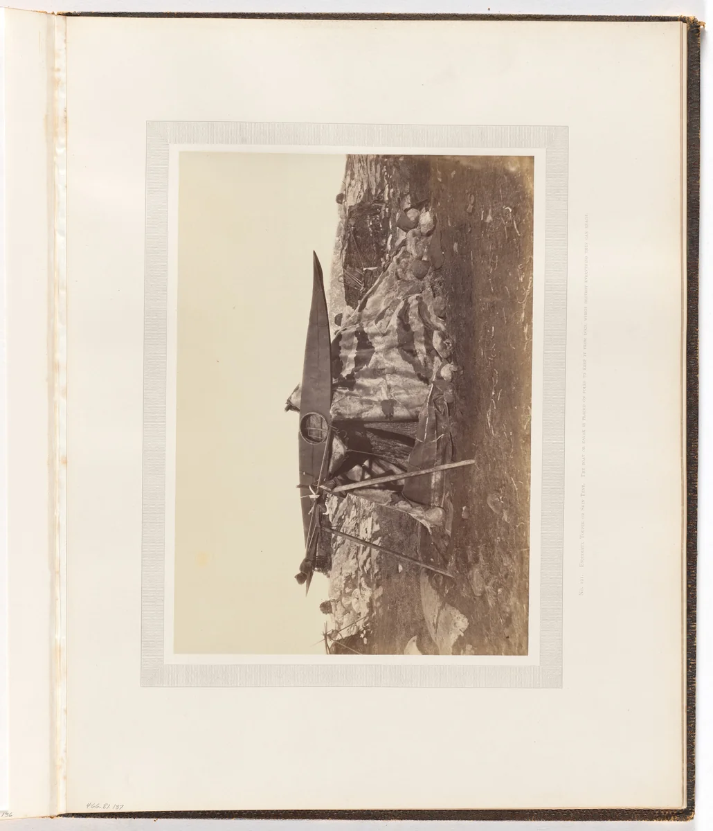 "Esquimaux Toupek or Skin Tent. The boat or kayak is placed on poles to keepit from dogs, which destroy everything they can reach." by George P. Critcherson, John L. Dunmore, William Bradford, photograph, 1869