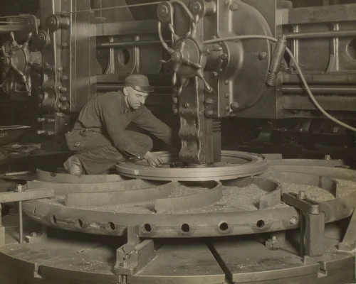 Worker at Grinding Machine by Lewis Wickes Hine, photograph, 1930-1931