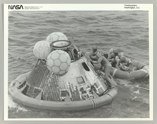 [Astronauts in Lifeboat After Apollo 11 Splashdown] by National Aeronautics and Space Administration, photograph, 1964-1974