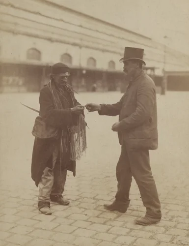 Shoelace Vendor by Eugène Atget, photograph, 1898