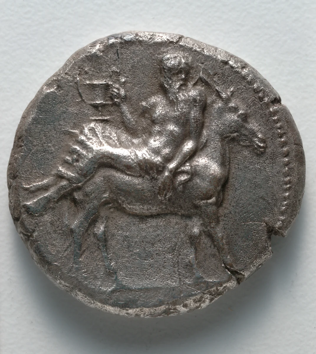 Tetradrachm: Dionysos with Kantharos on Donkey (obverse) by Unknown, metalwork, -435--425