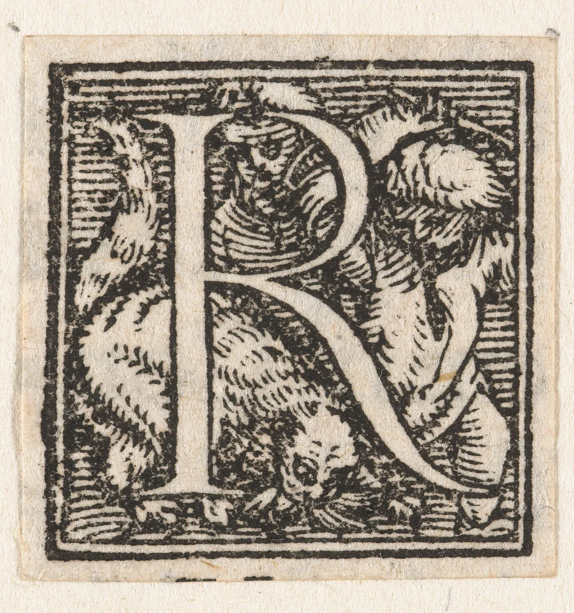 Letter R met twee kinderen die kat slaan by Hans Holbein, print, 1522-1526