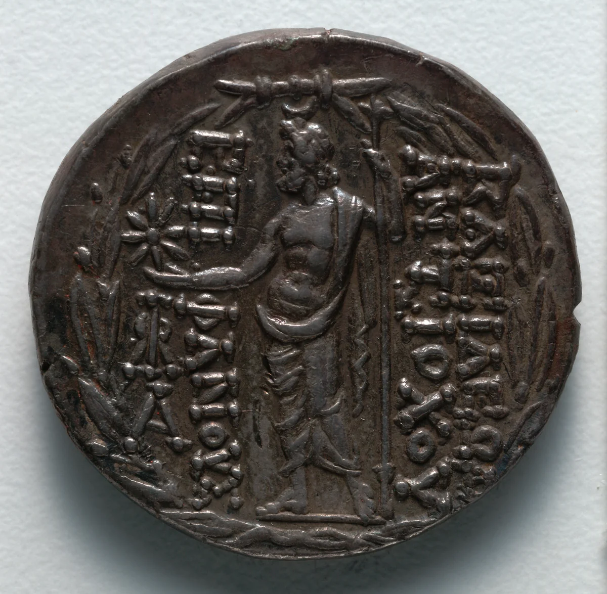 Tetradrachm: Zeus Ouranios within Olive Wreath (reverse) by Unknown, metalwork, -112--110